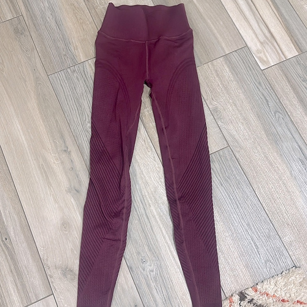 Sculptknit by Fabletics maroon/burgundy leggings with cutout details on legs - Picture 2 of 5